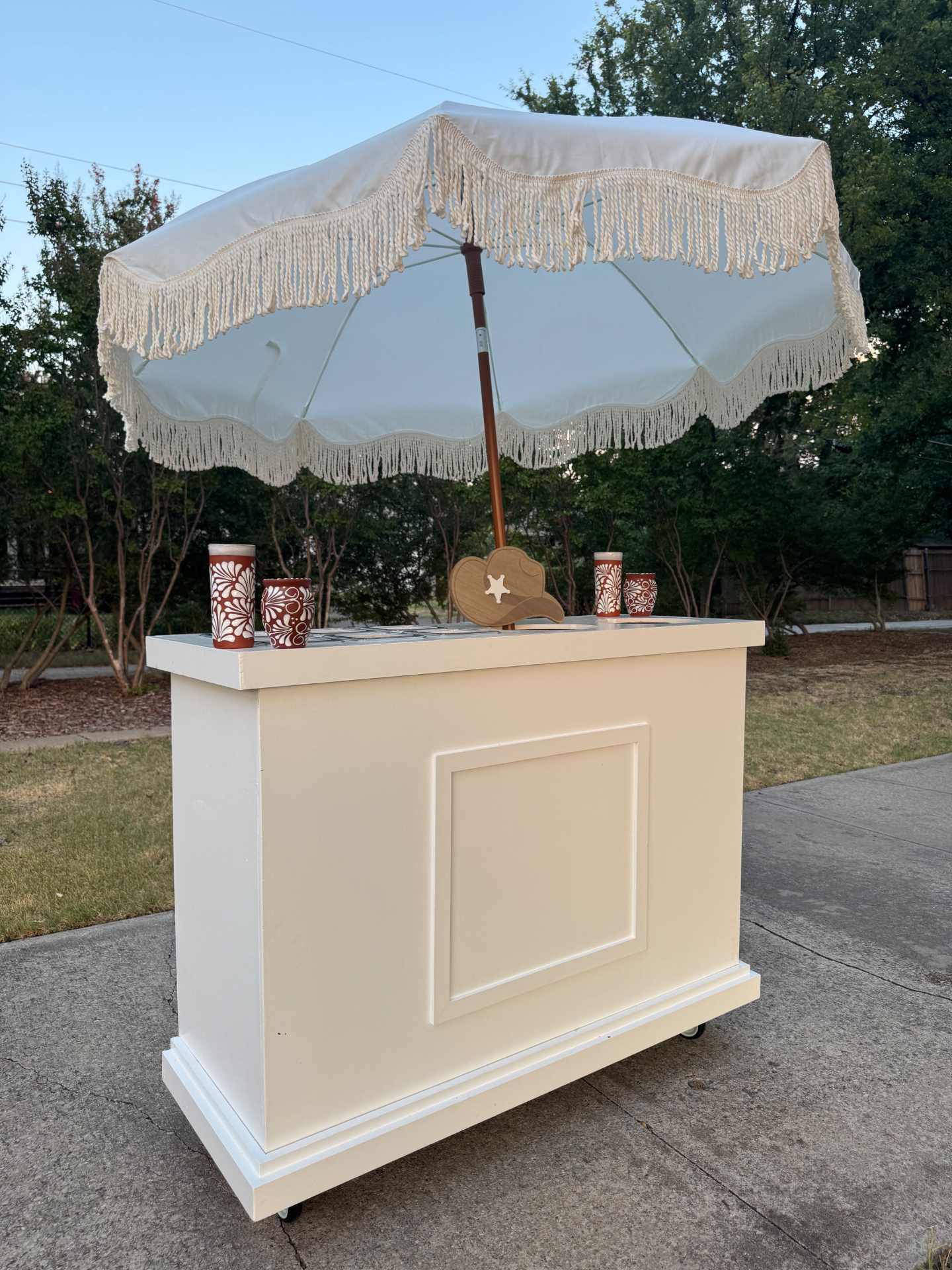 The Vaquerita Cart with hand-painted cups ready to serve